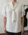 elegancka-bluzka-z-wiazaniem-plus-size-biala